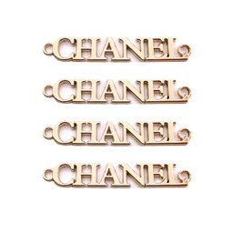 تصویر مارک فلزی کیف طلایی مدل CHANEL طول 5 سانتی‌متر بسته 4 عددی